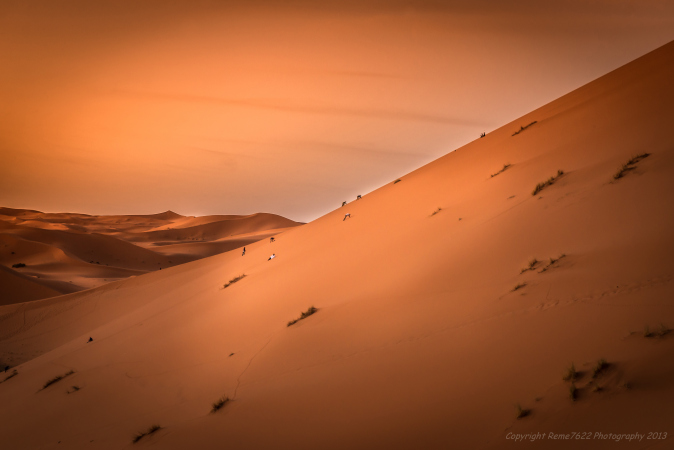 Climbing the dunes for sunrise, Erg Chebbi, Sahara, Morocco