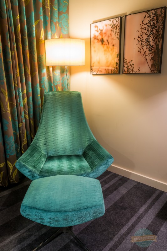 Chair in a bedroom at the Apex London Wall