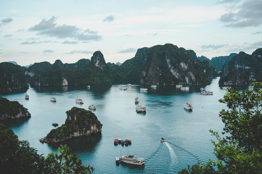 Halong Bay  is known for its emerald waters and thousands of towering limestone islands topped by rainforests.