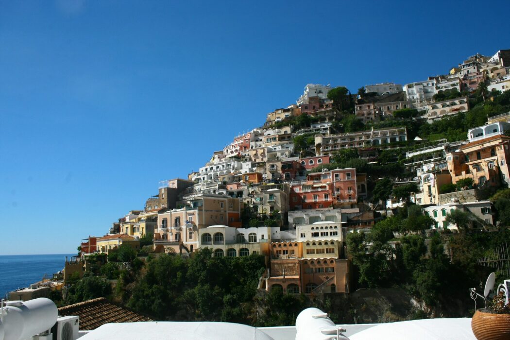 Houses clinging to the hillside in a European town